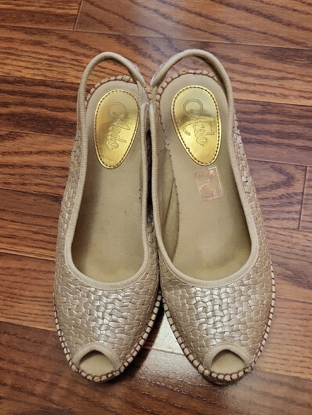 Aedo chic beige woven peep-toe slingback sandals.